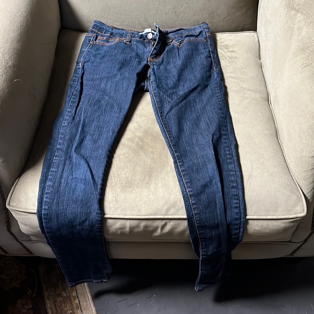 Selling a size 26 pair of dark blue skinny jeans.